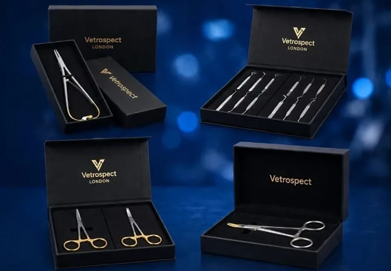 Four open black Vetrospect presentation boxes with the gold logo: a Mathieu needle holder, a set of dental instruments, two needle holders with gold handles and a pair of forceps