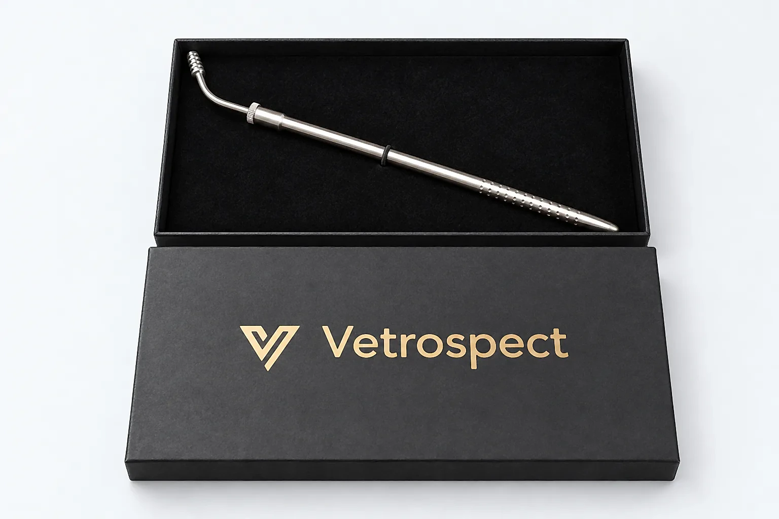 Vetrospect instrument in its open black box, with the lid and gold Vetrospect logo in the foreground